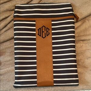 Striped Black and Brown laptop case w/Dee embroidered on it